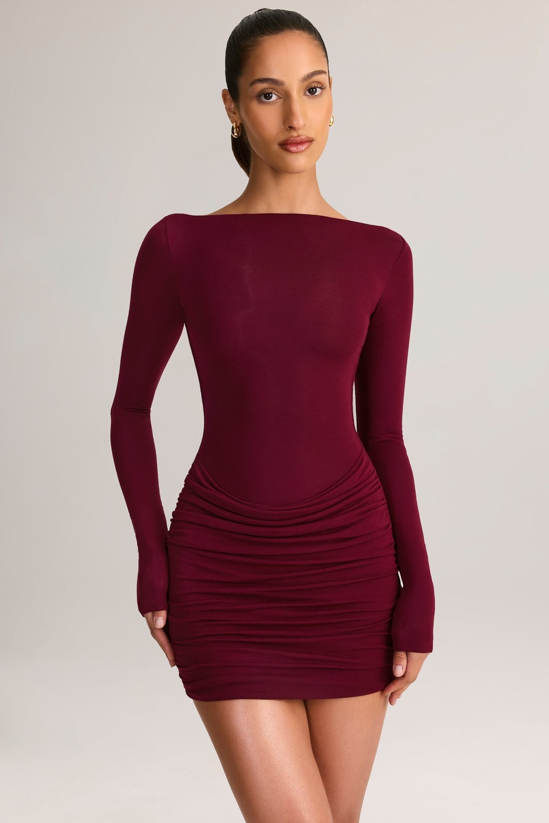 Burgundy Long-Sleeved Mini Dress With Ruched Skirt Burgundy Long-Sleeved Mini Dress With Ruched Skirt — Burgundy Dress