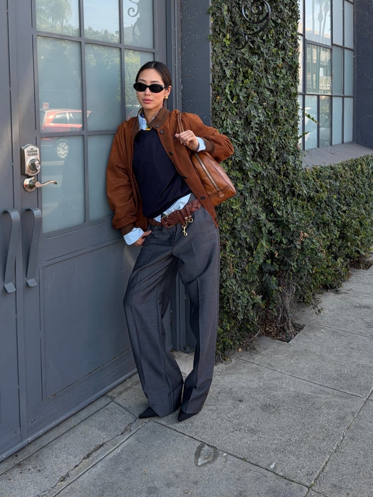 Brown suede bomber jacket over shirt and gray trousers Brown suede bomber jacket over shirt and gray trousers — Business Outfits