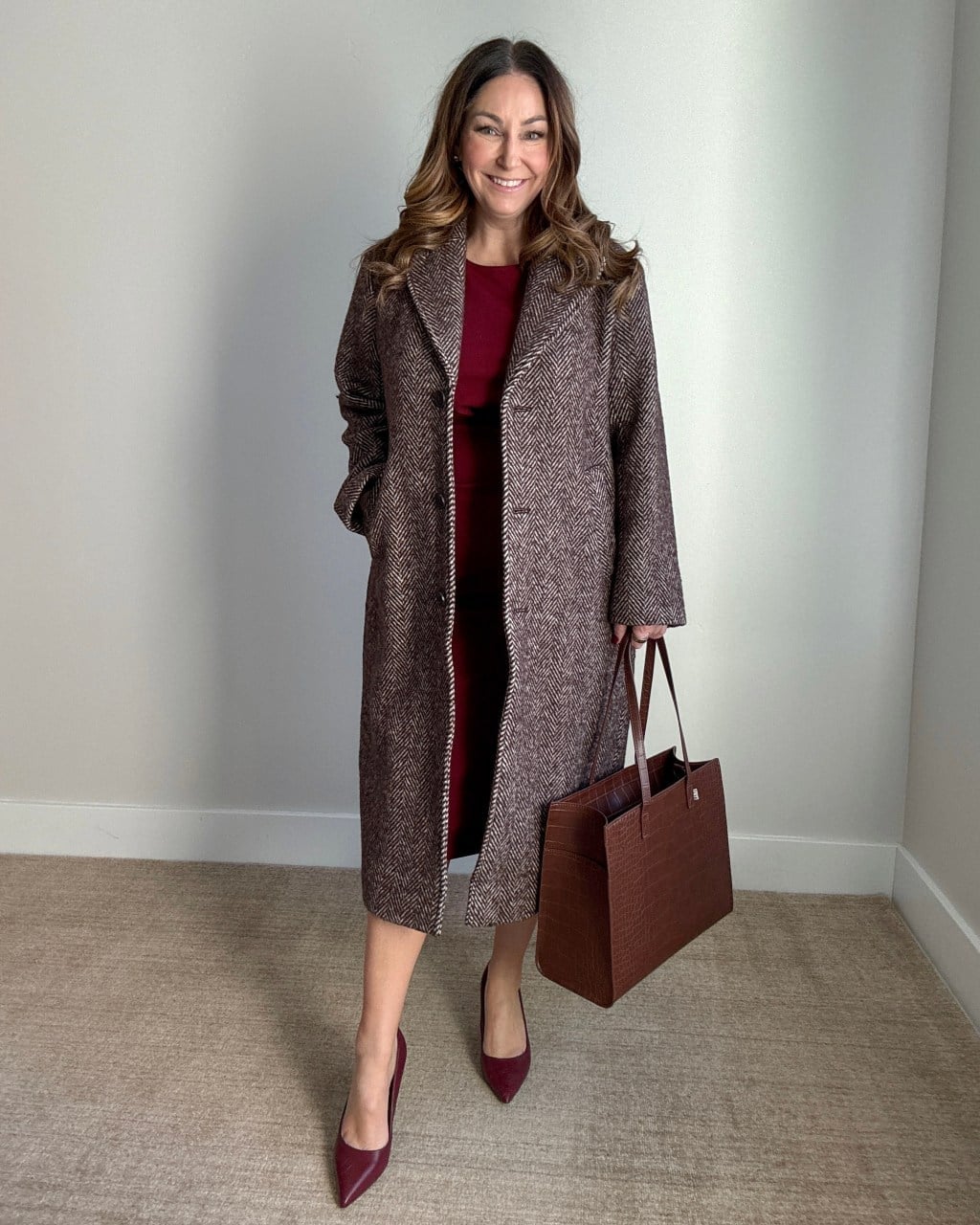 Herringbone Tweed Coat Over Burgundy Dress Herringbone Tweed Coat Over Burgundy Dress — Business Professional Outfits