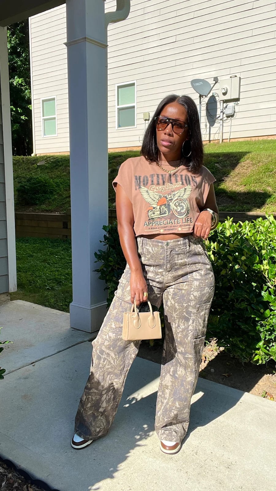 Cropped Brown Graphic Tee Balances Wide-Leg Camo Pants Cropped Brown Graphic Tee Balances Wide-Leg Camo Pants — Camo Outfits