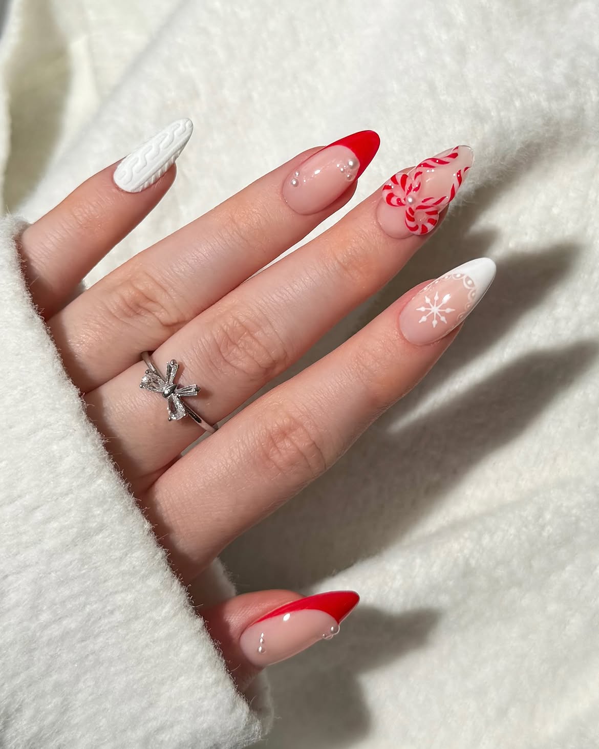 Candy Cane Swirl French Tip Almond Nails