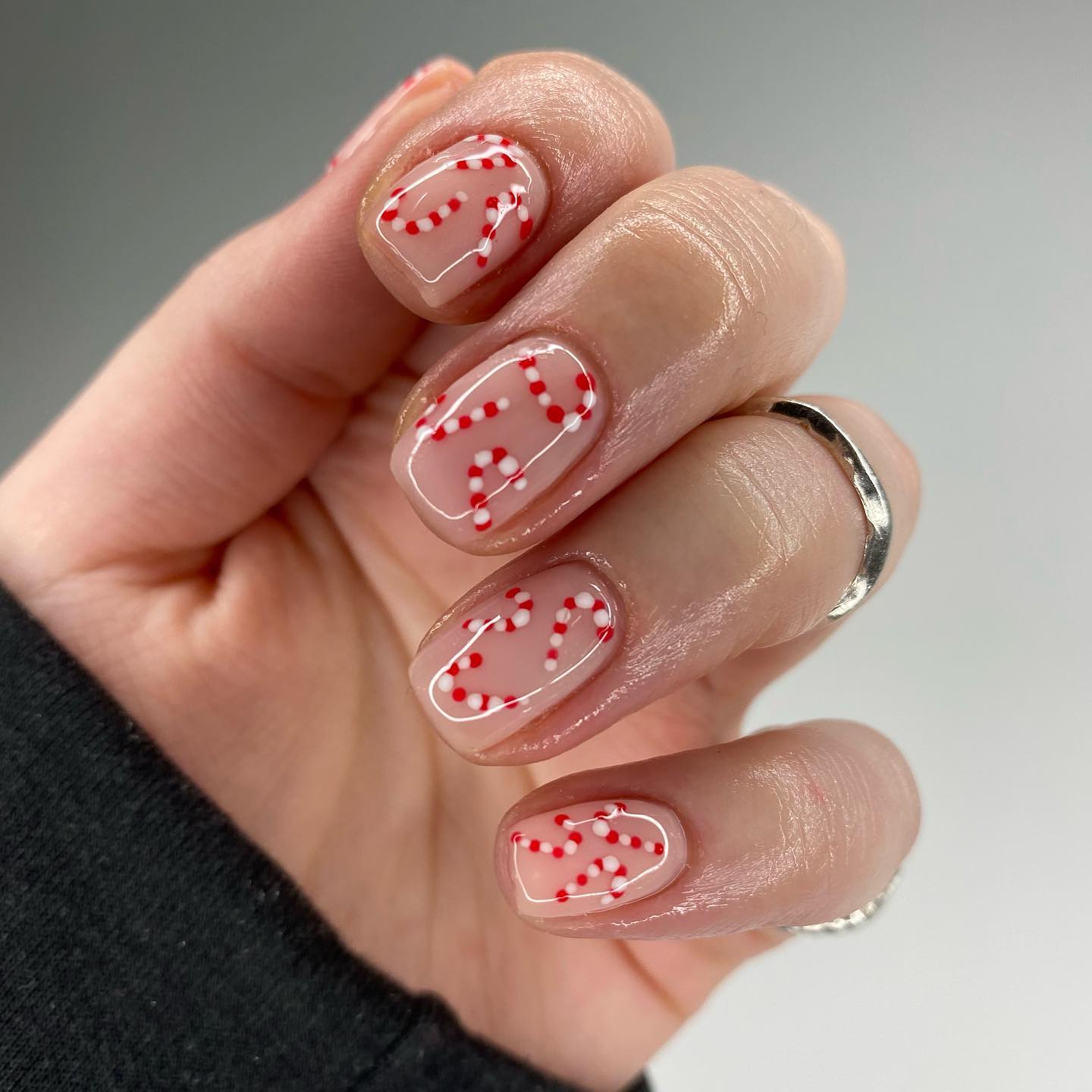Candy Cane Swirls Glossy Short Almond Nails