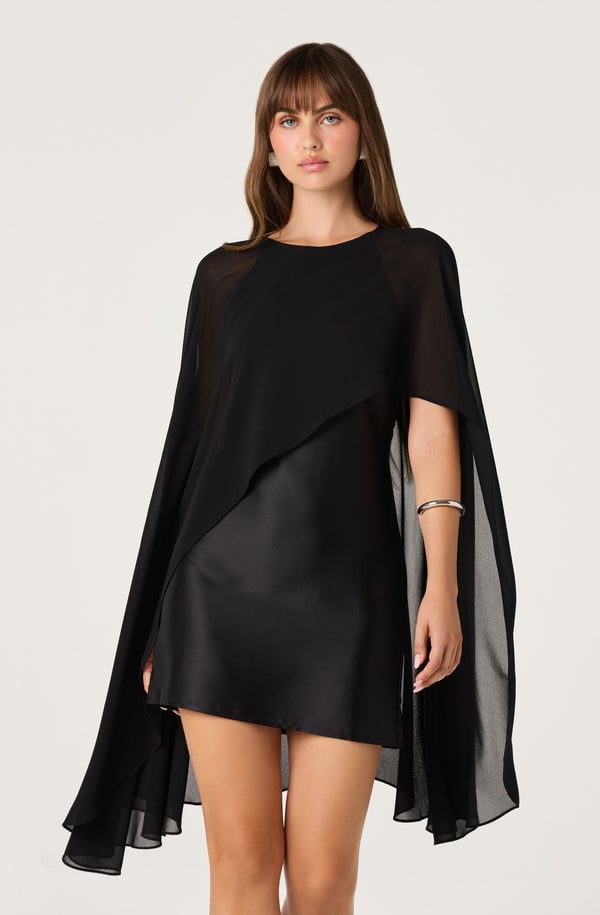 Black chiffon cape overlay on an a-line mini dress, Close-Up Take Black chiffon cape overlay on an a-line mini dress, Close-Up Take — Cape Outfits