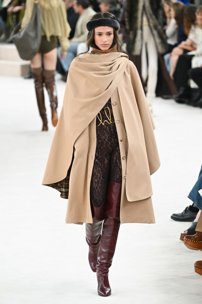 Layered beige wool cape for an autumn fashion show Layered beige wool cape for an autumn fashion show — Cape Outfits