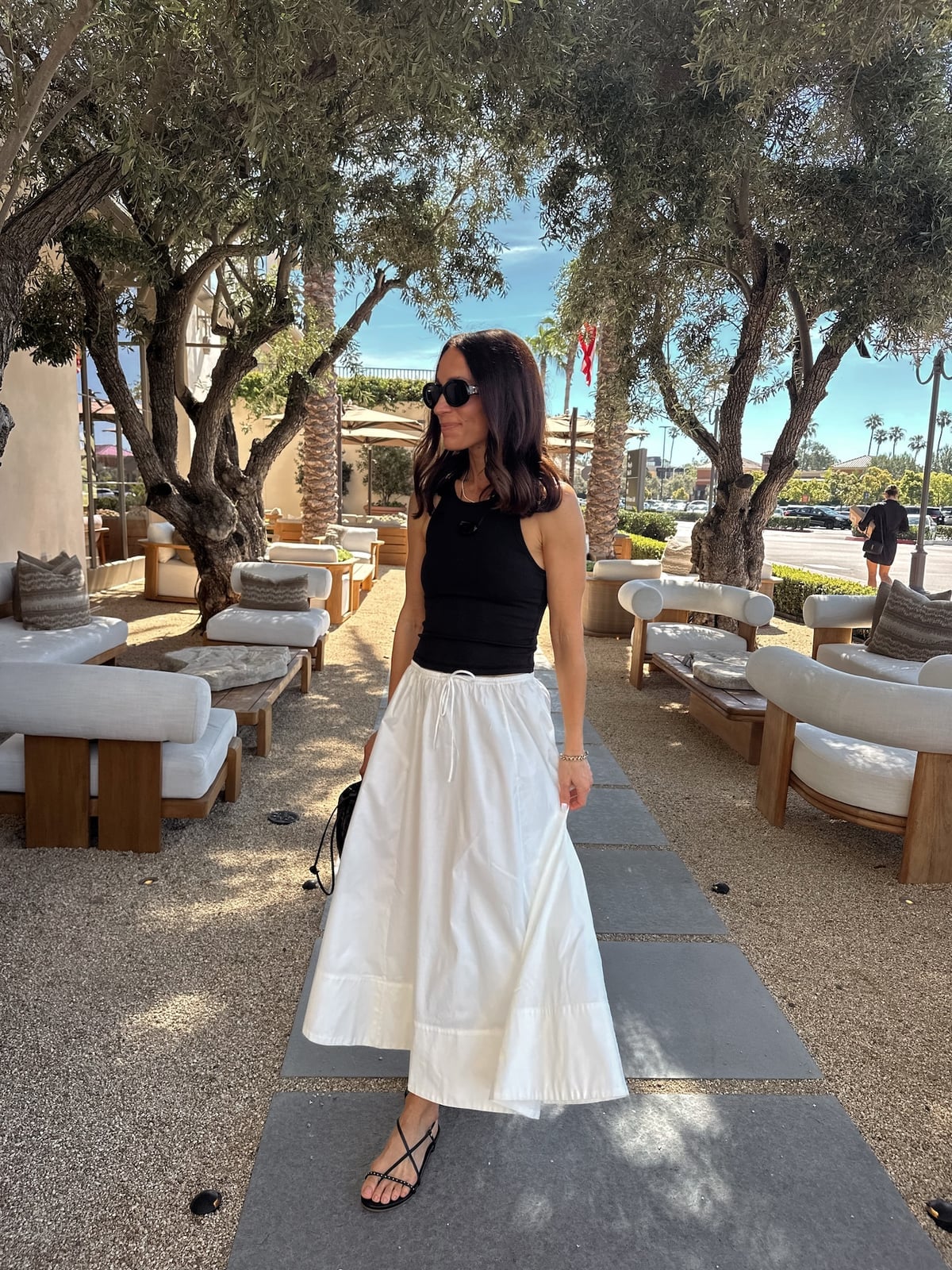 Fitted Black Tank With Voluminous White Midi Skirt Fitted Black Tank With Voluminous White Midi Skirt — Capsule Wardrobe