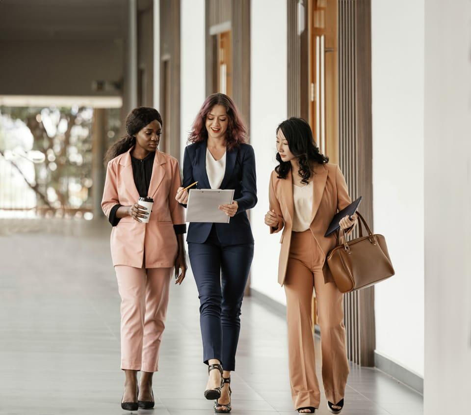 Group of women in blazers and tailored trousers Group of women in blazers and tailored trousers — Casual Work Outfits