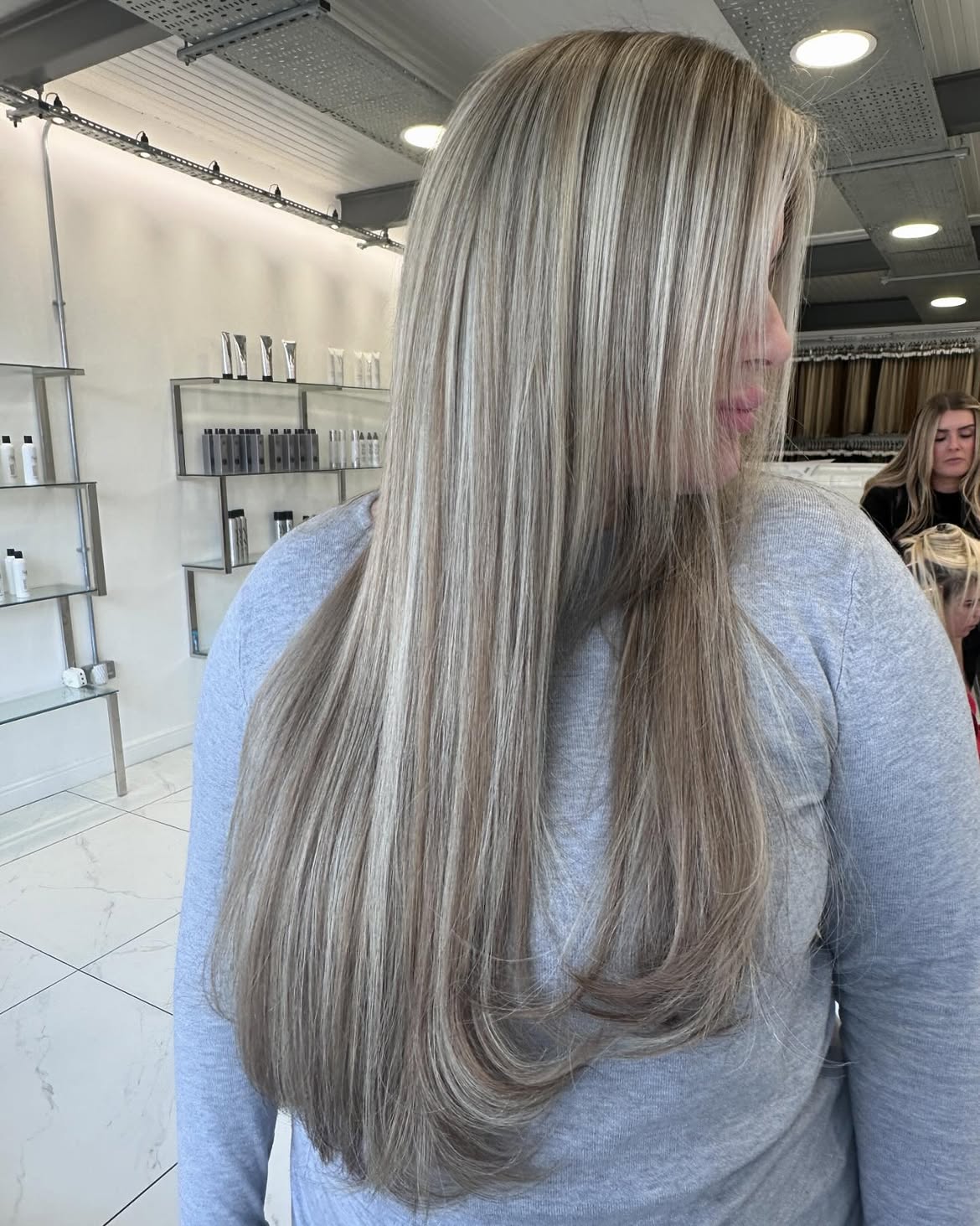Champagne Blonde With Face Framing Highlights