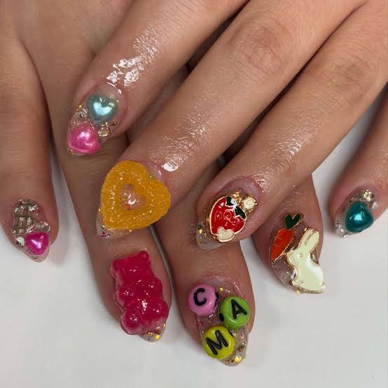 Medium Almond Nails With Playful 3D Charms Medium Almond Nails With Playful 3D Charms — Charm Nails