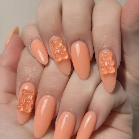 Medium Almond Peach Nails With Gummy Bears Medium Almond Peach Nails With Gummy Bears — Charm Nails