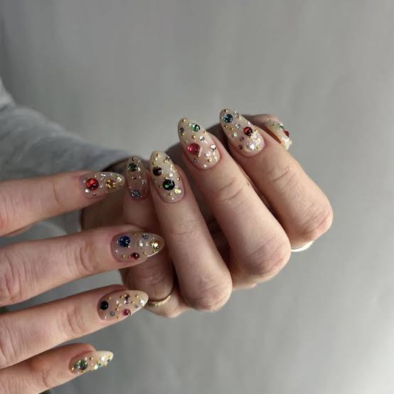 Medium Almond Nude Nails With Scattered Gems Medium Almond Nude Nails With Scattered Gems — Charm Nails