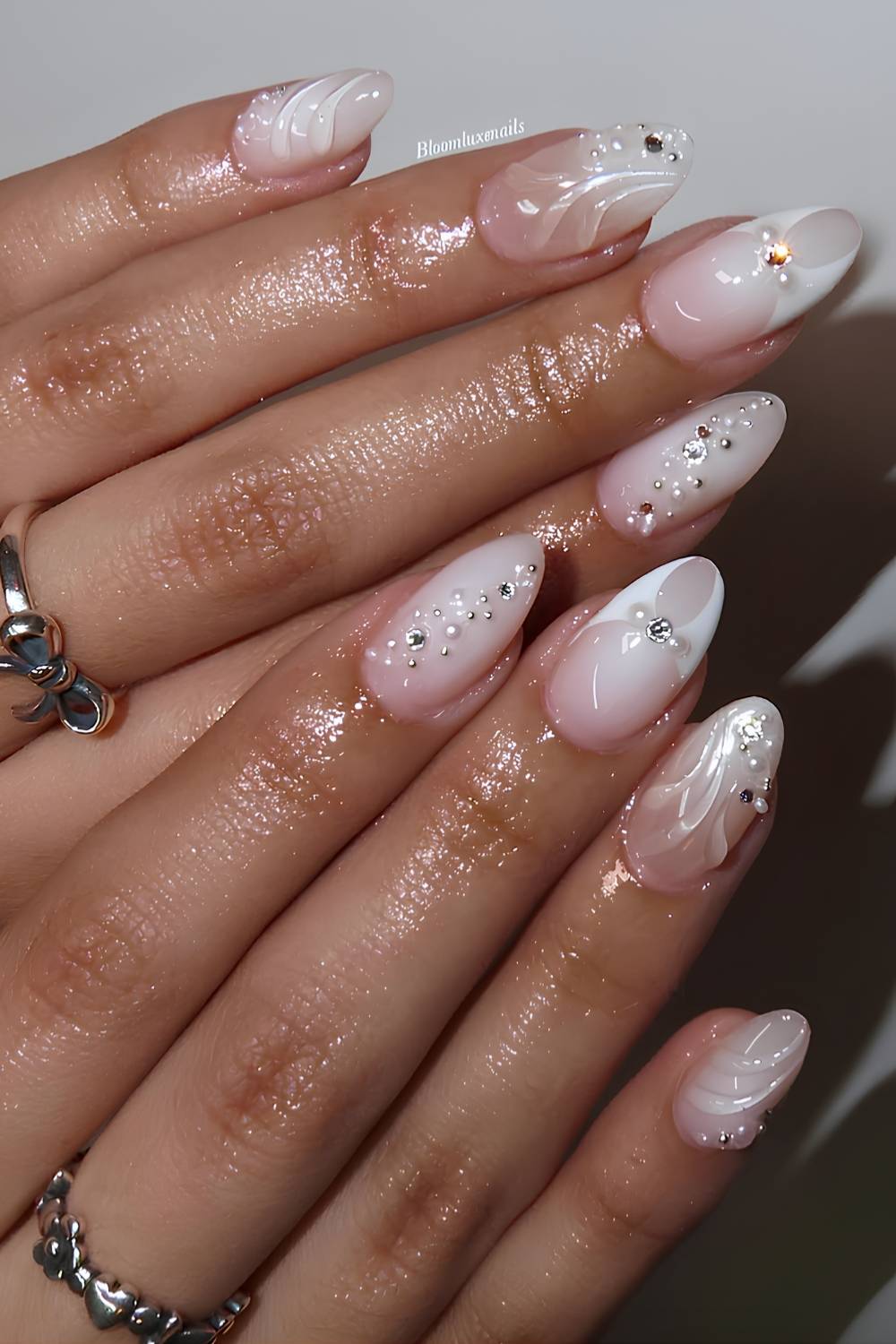 Medium Almond Nude Nails With Rhinestones And Pearls Medium Almond Nude Nails With Rhinestones And Pearls — Charm Nails