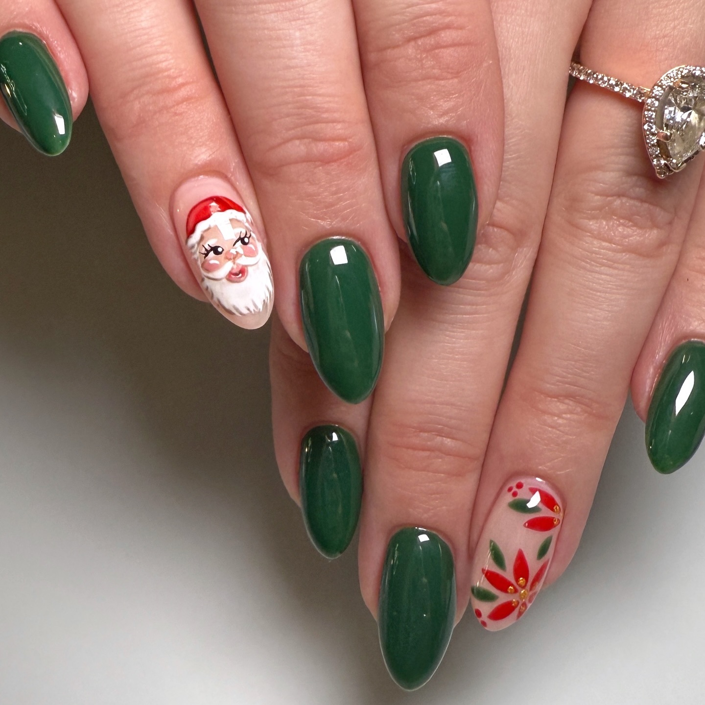 Charming Santa Face and Poinsettia Christmas Nails