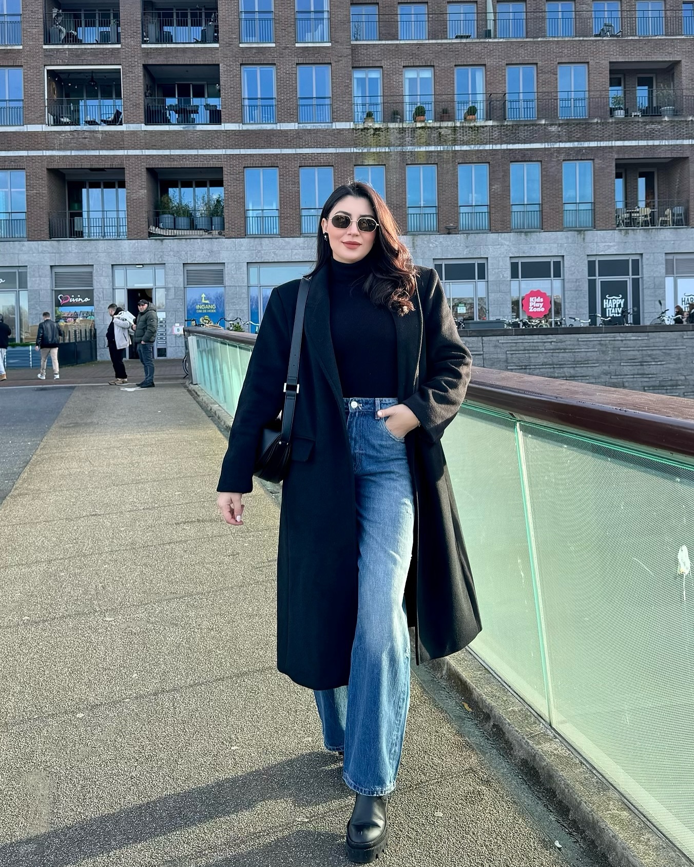 Chic Black Coat Over Denim Work Ensemble