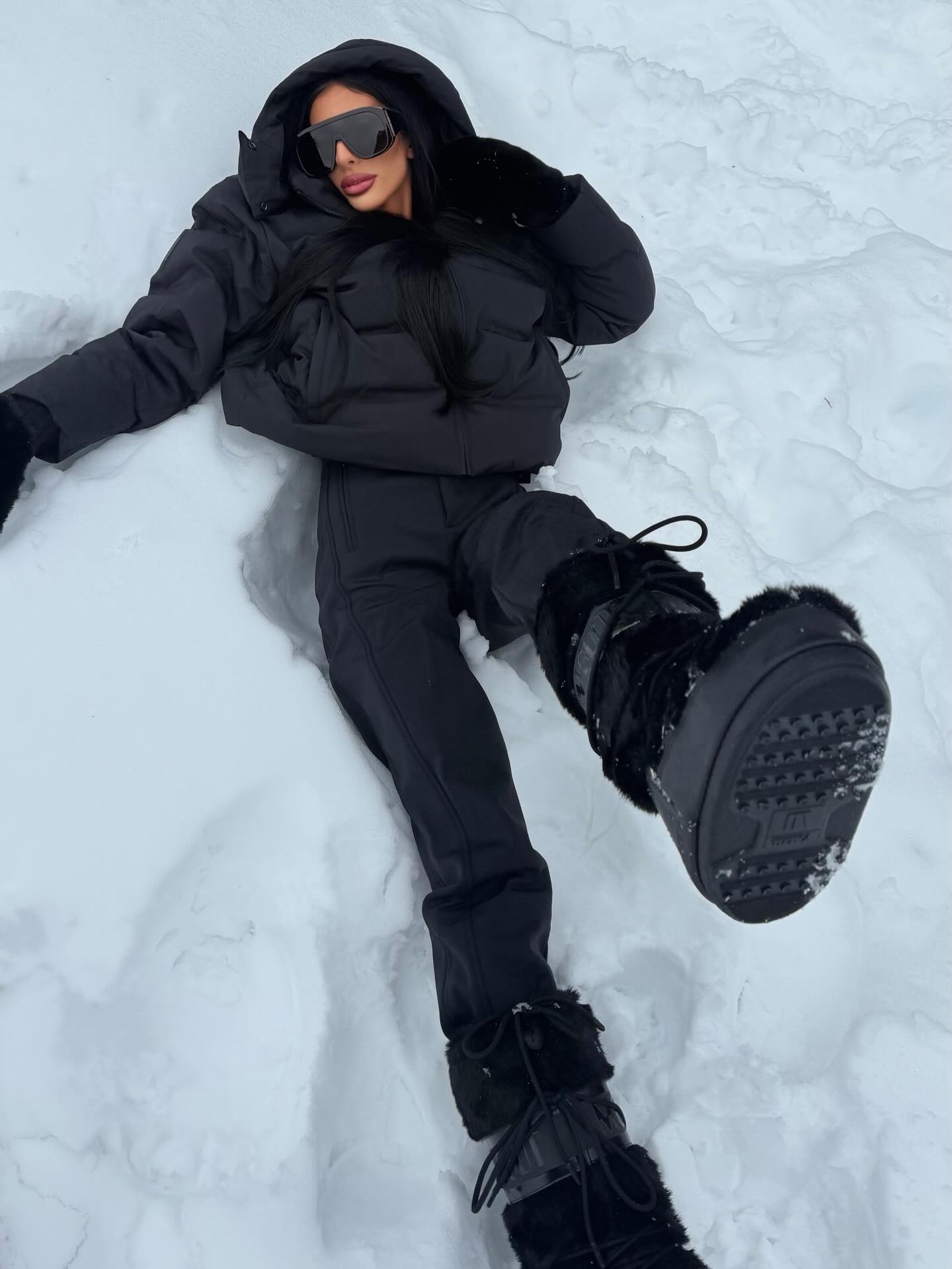 Chic Black Puffer and Moon Boot Snow Look