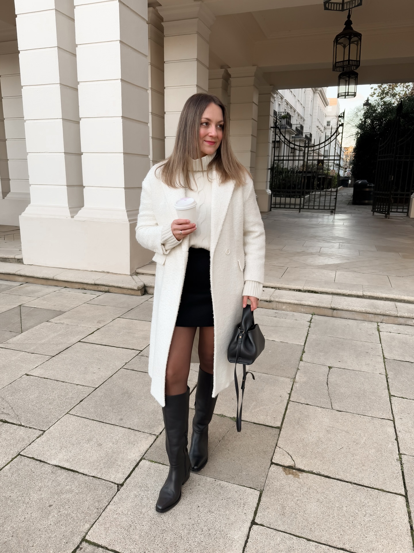 Chic Cream Turtleneck With Black Mini Skirt