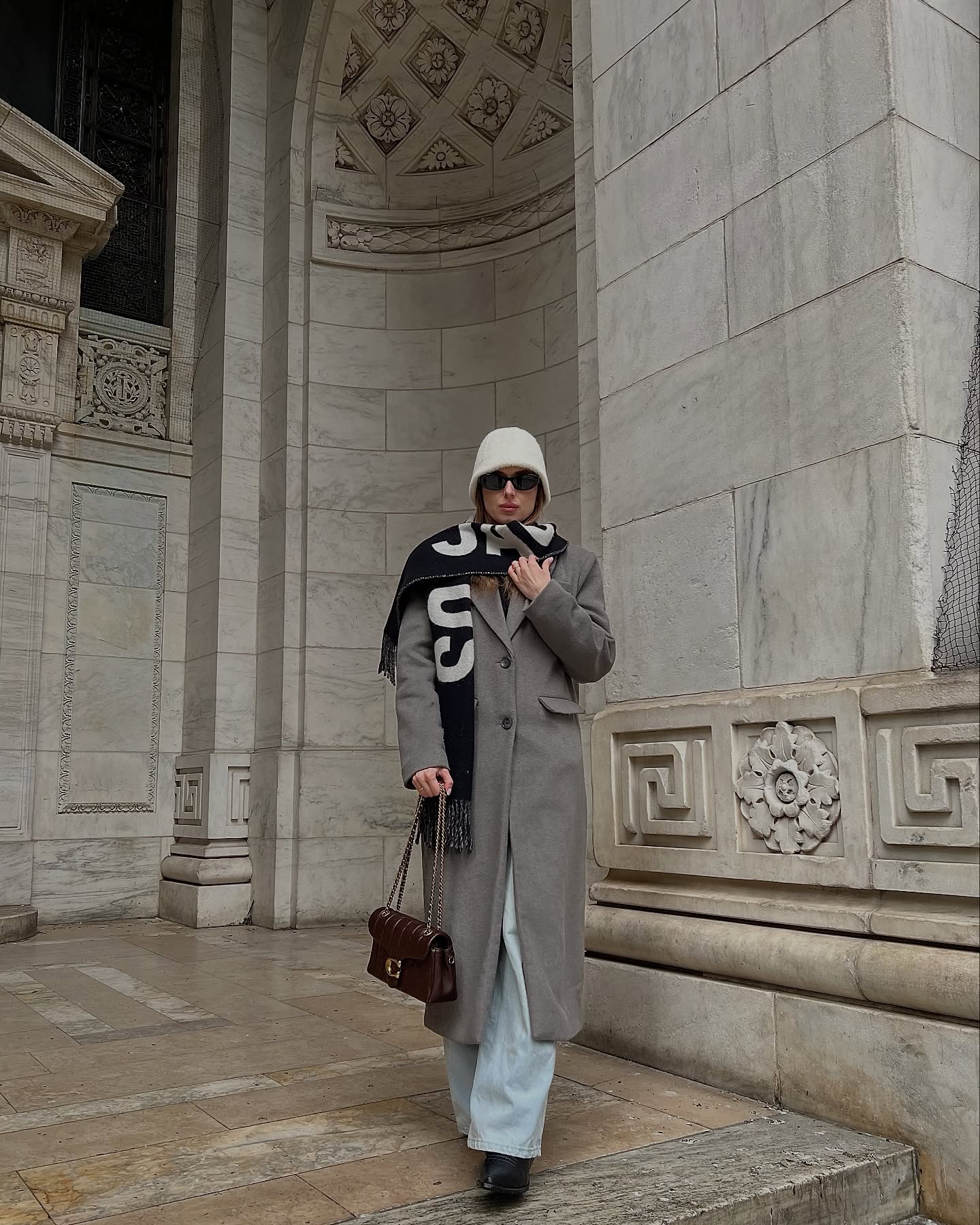Chic Grey Coat With Light Wash Denim and Bucket Hat
