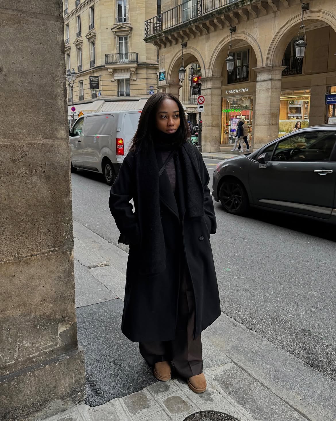 Chic Monochromatic Black Coat and Brown Trousers