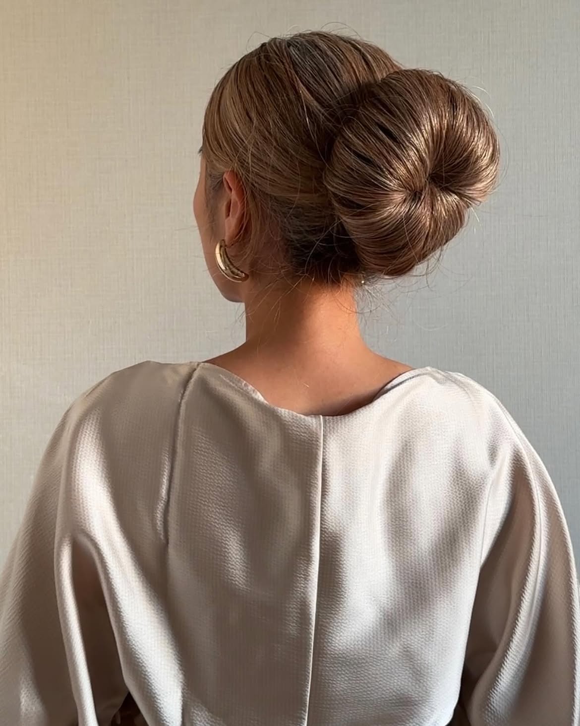 Chic Sleek Double Bun Hairstyle