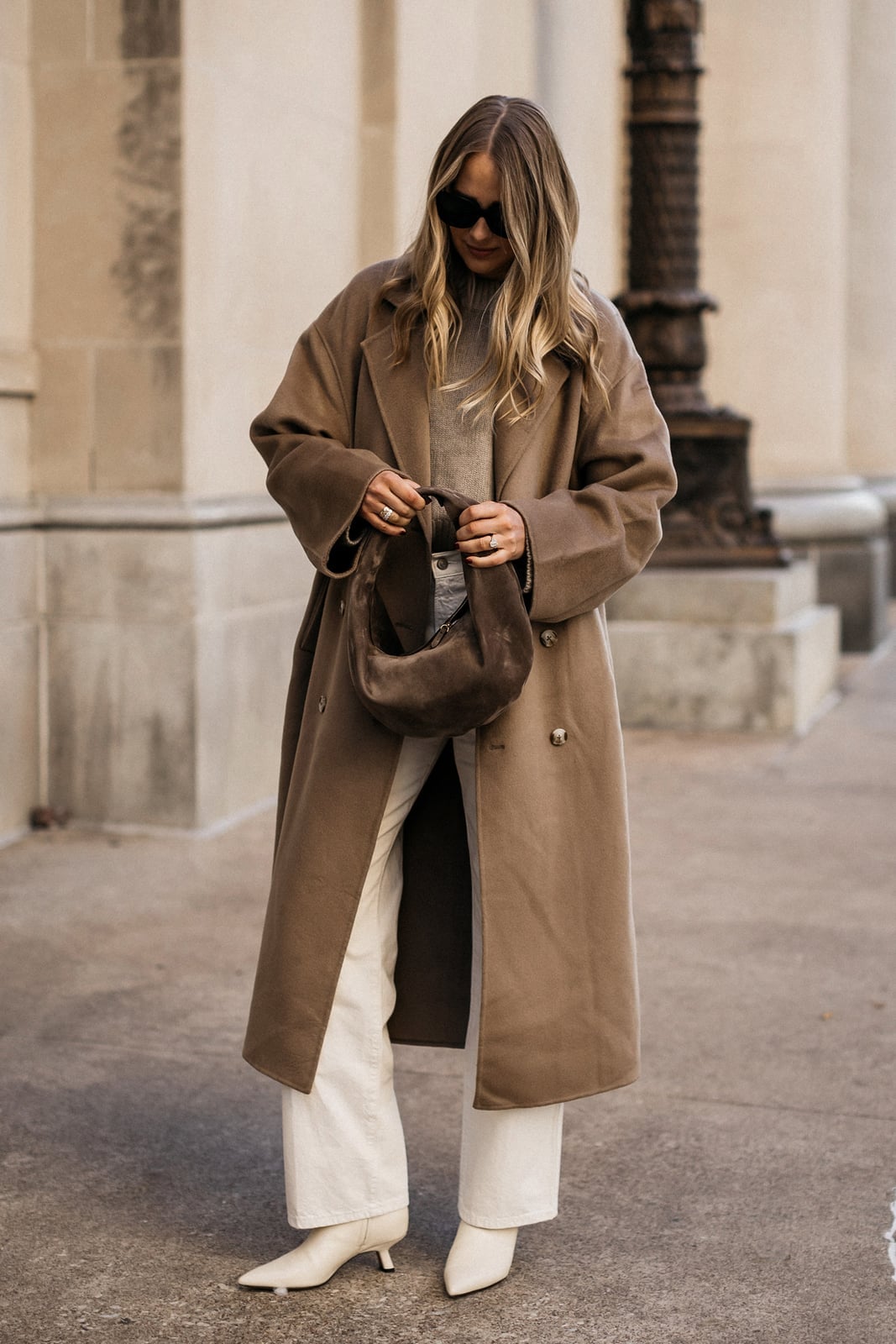 Camel wool coat over gray knit sweater and cream trousers Camel wool coat over gray knit sweater and cream trousers — Chic Style