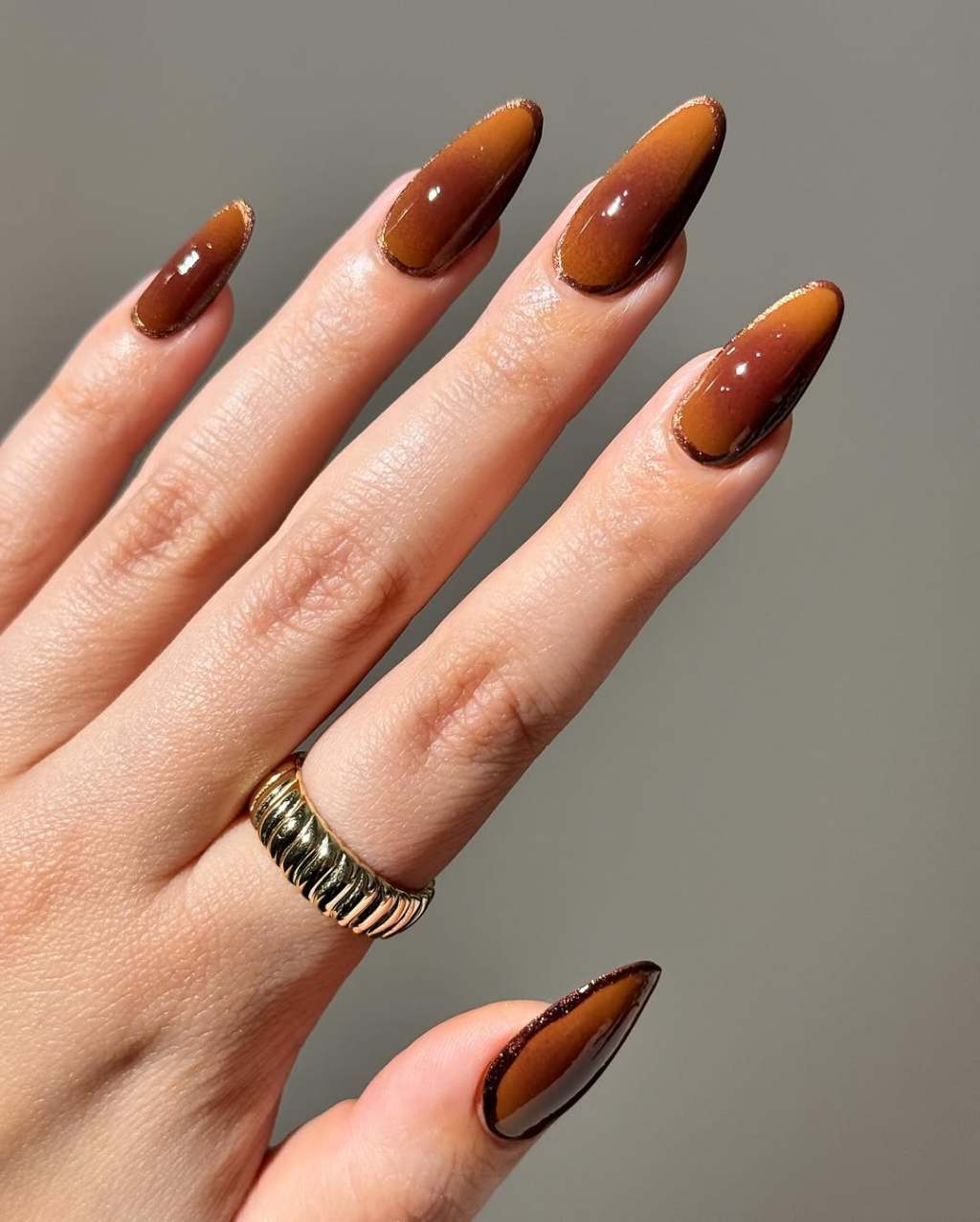 Deep Brown Almond Nails with Gold Glitter Cuticle Line Deep Brown Almond Nails with Gold Glitter Cuticle Line — Chocolate Nails