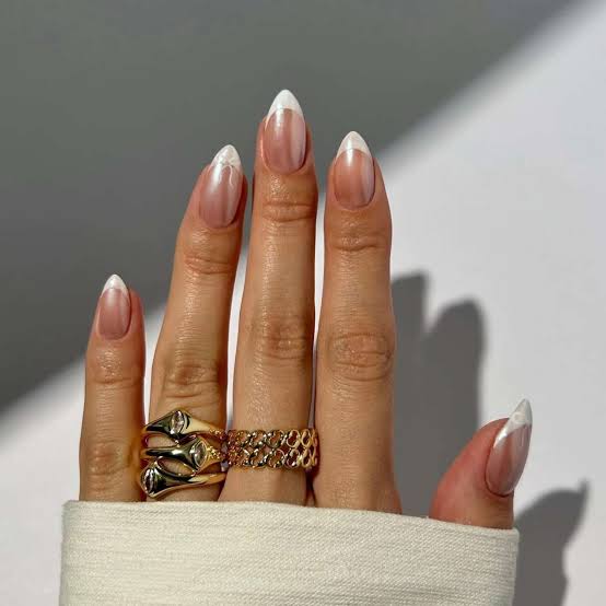 Sheer Nude Chrome French Tip Almond Nails, Close-Up Take Sheer Nude Chrome French Tip Almond Nails, Close-Up Take — Chrome Nails Colors