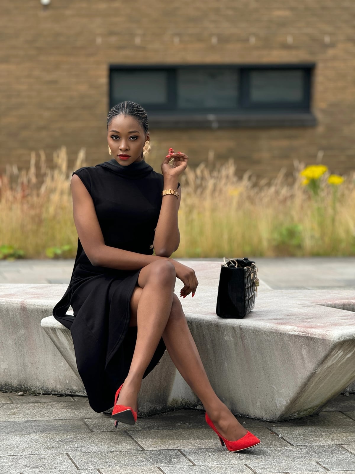 Black sleeveless dress with gold buttons and red heels Black sleeveless dress with gold buttons and red heels — Church Outfits Black Women