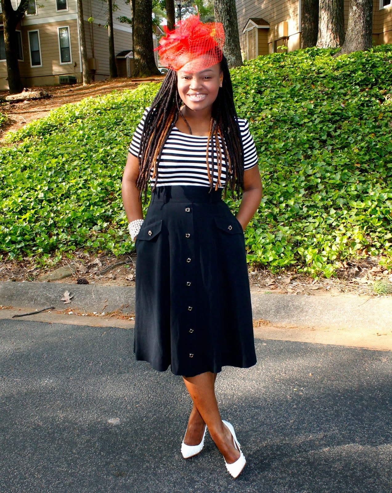 Striped top with black midi skirt and red fascinator Striped top with black midi skirt and red fascinator — Church Outfits Black Women