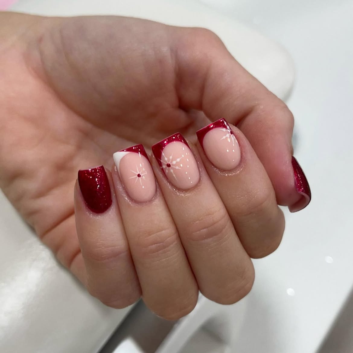 Classic Red French Tip Snowflake Nails