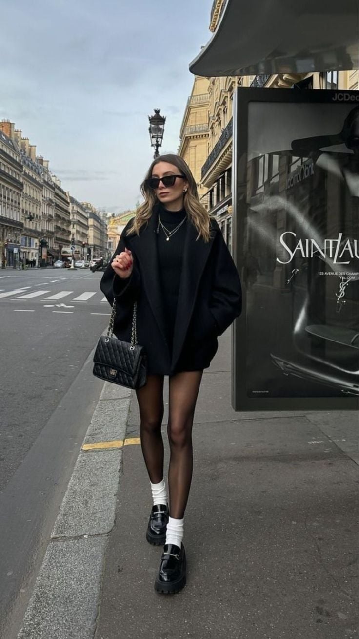 Black oversized coat over mini skirt and loafers Black oversized coat over mini skirt and loafers — Classy Outfits
