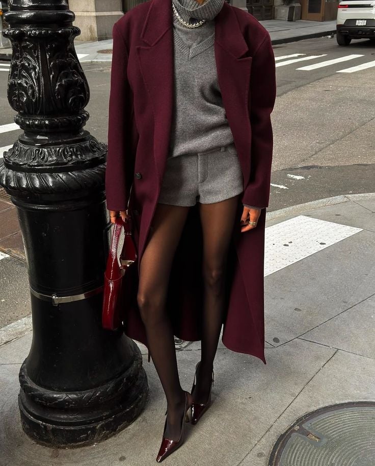 Burgundy coat over gray sweater and silk shorts Burgundy coat over gray sweater and silk shorts — Classy Outfits