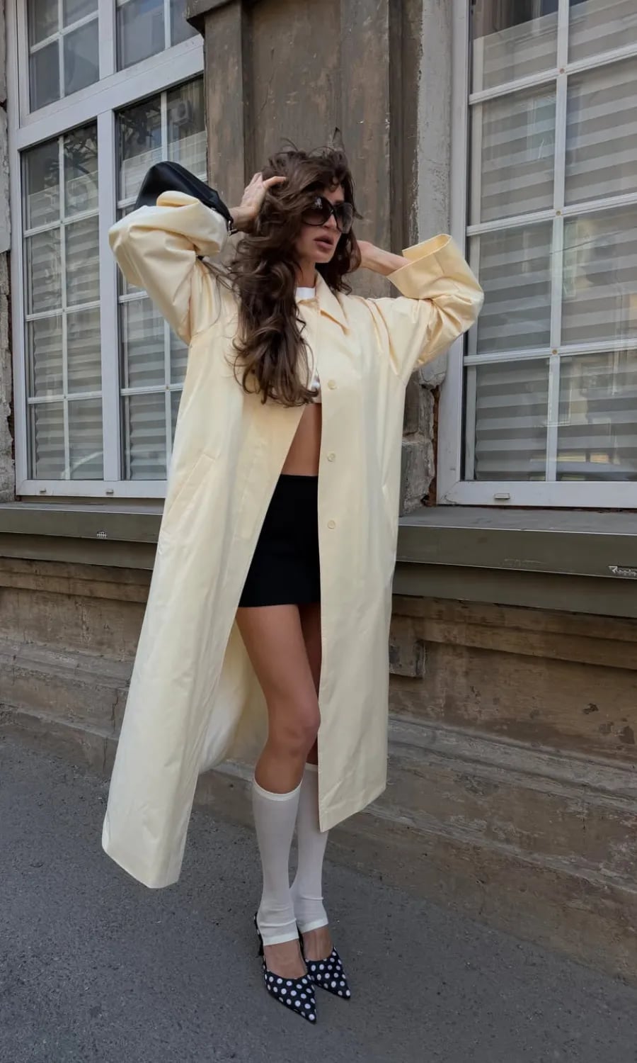 Pale yellow trench coat over mini skirt Pale yellow trench coat over mini skirt — Classy Outfits
