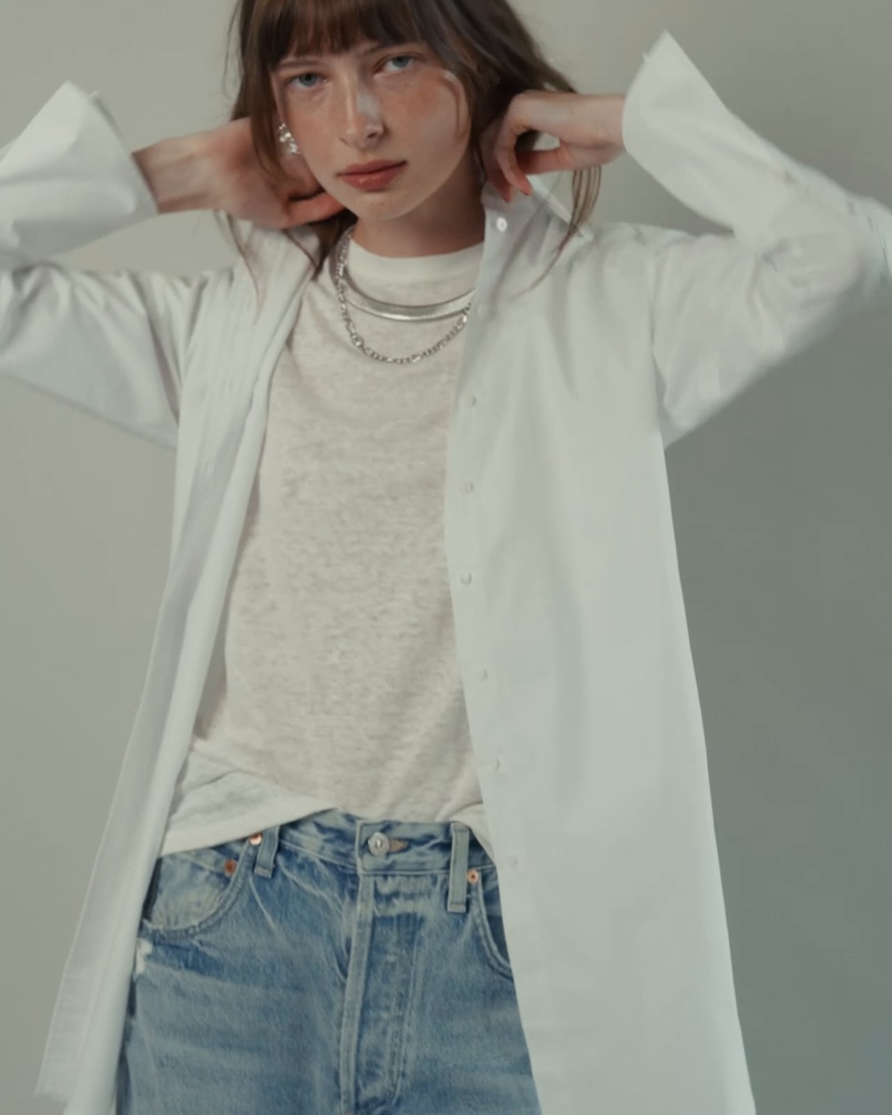 Layered White Oversized Shirt Over Gray Tee Layered White Oversized Shirt Over Gray Tee — Clean Girl Outfits