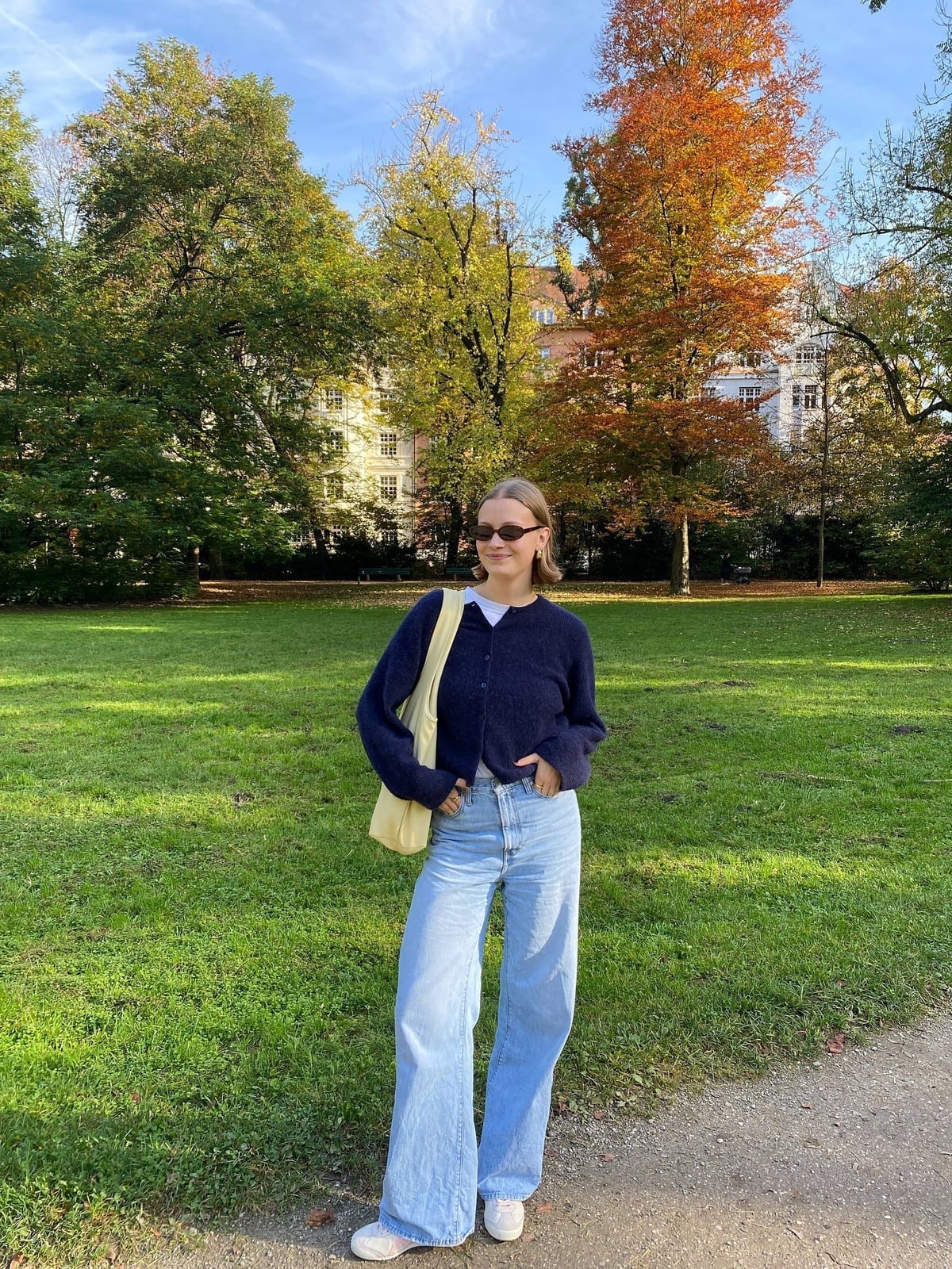 Navy Cardigan Over White Tee with Light Blue Jeans Navy Cardigan Over White Tee with Light Blue Jeans — Clean Girl Outfits