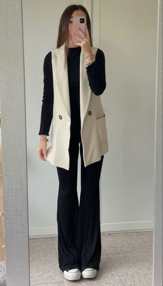 Sleeveless blazer over black separates Sleeveless blazer over black separates — College Outfits