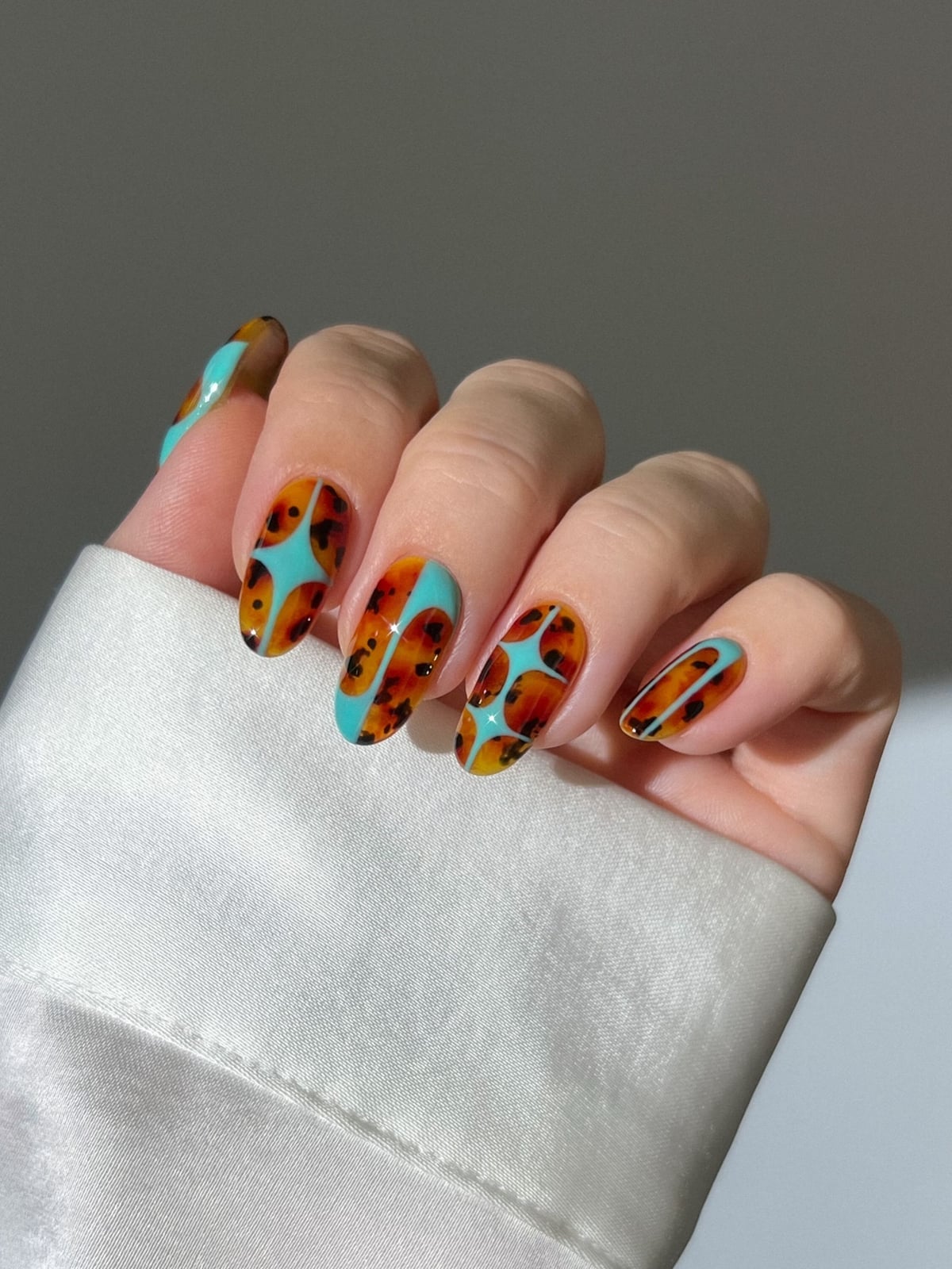 Turquoise With Tortoise Shell Print Turquoise With Tortoise Shell Print — Colorful Nails
