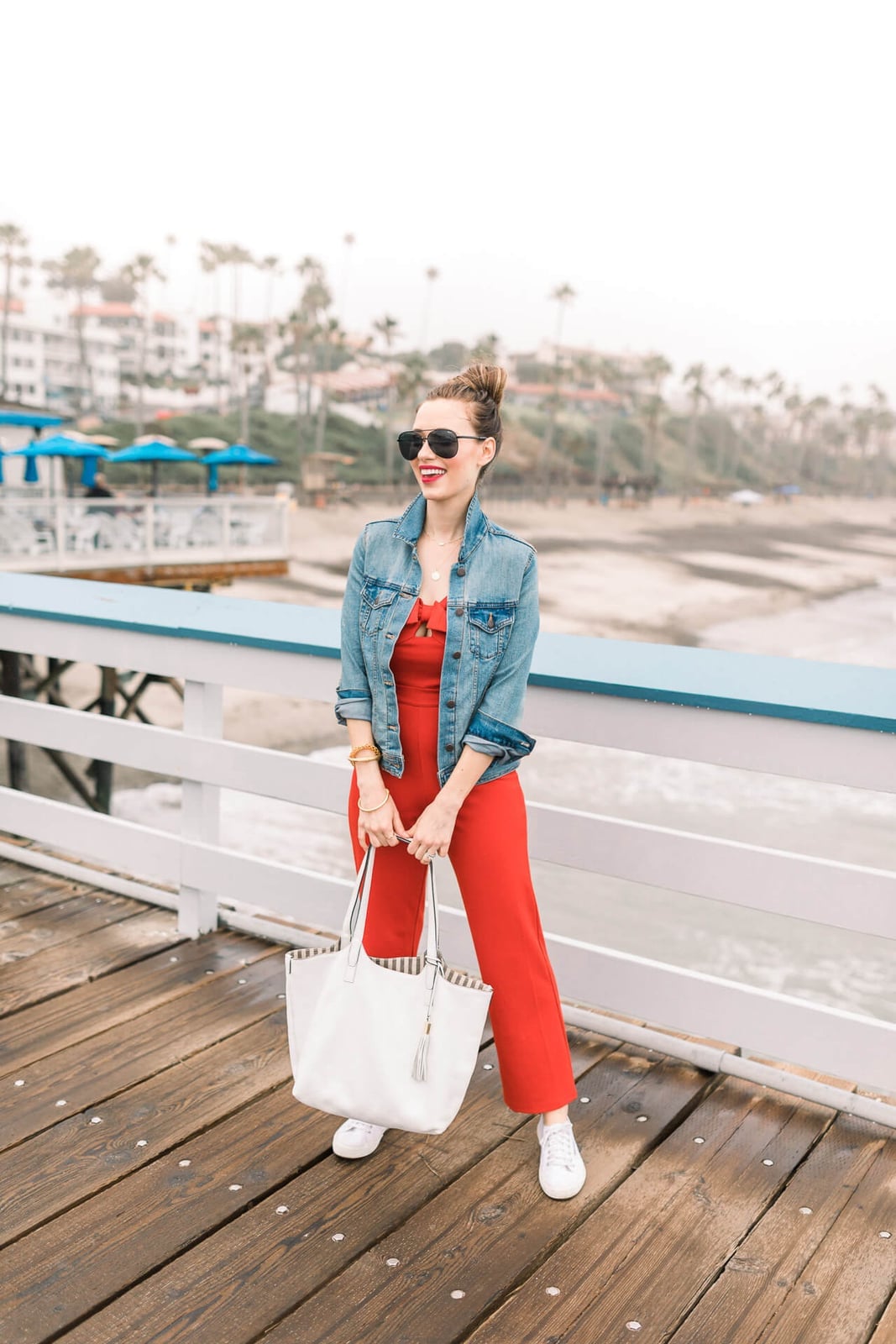 Denim jacket adds casual layer to a jumpsuit Denim jacket adds casual layer to a jumpsuit — Comfy Outfits