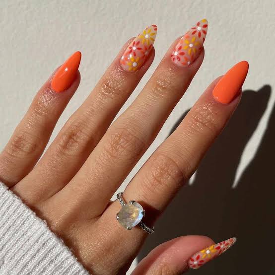 Bright Orange Floral Pattern Stiletto Nails Bright Orange Floral Pattern Stiletto Nails — Concert Nails