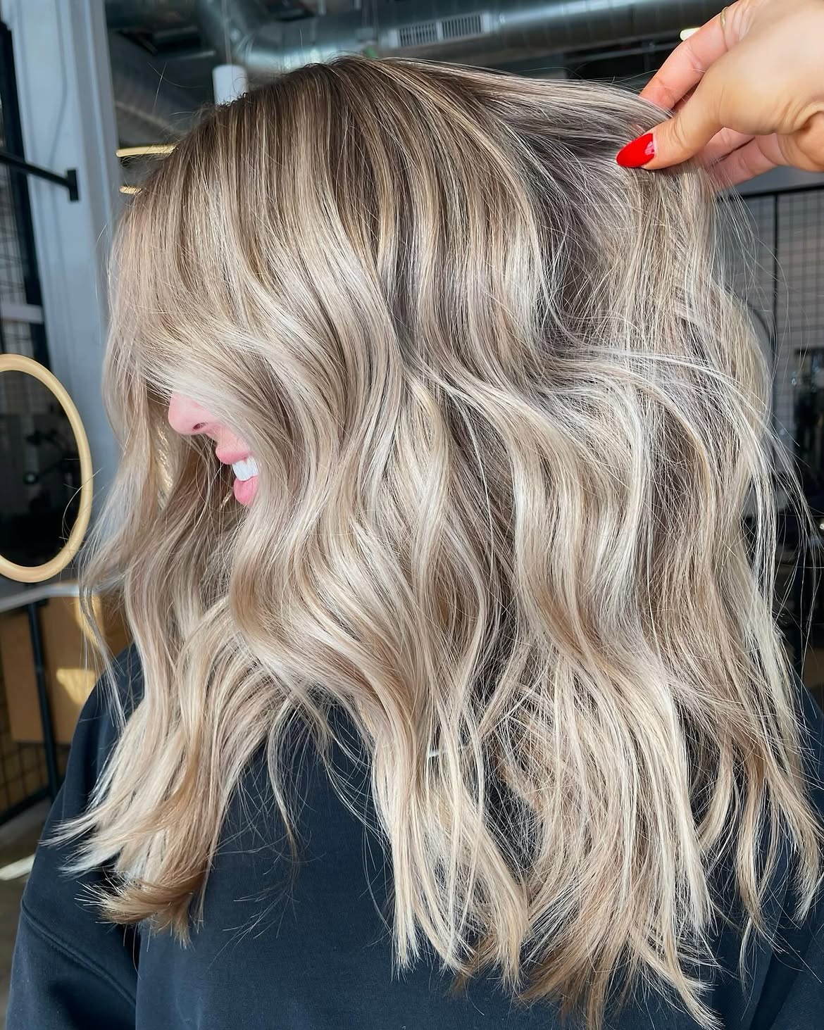 Cool Ash Blonde Waves With Subtle Shadow Root