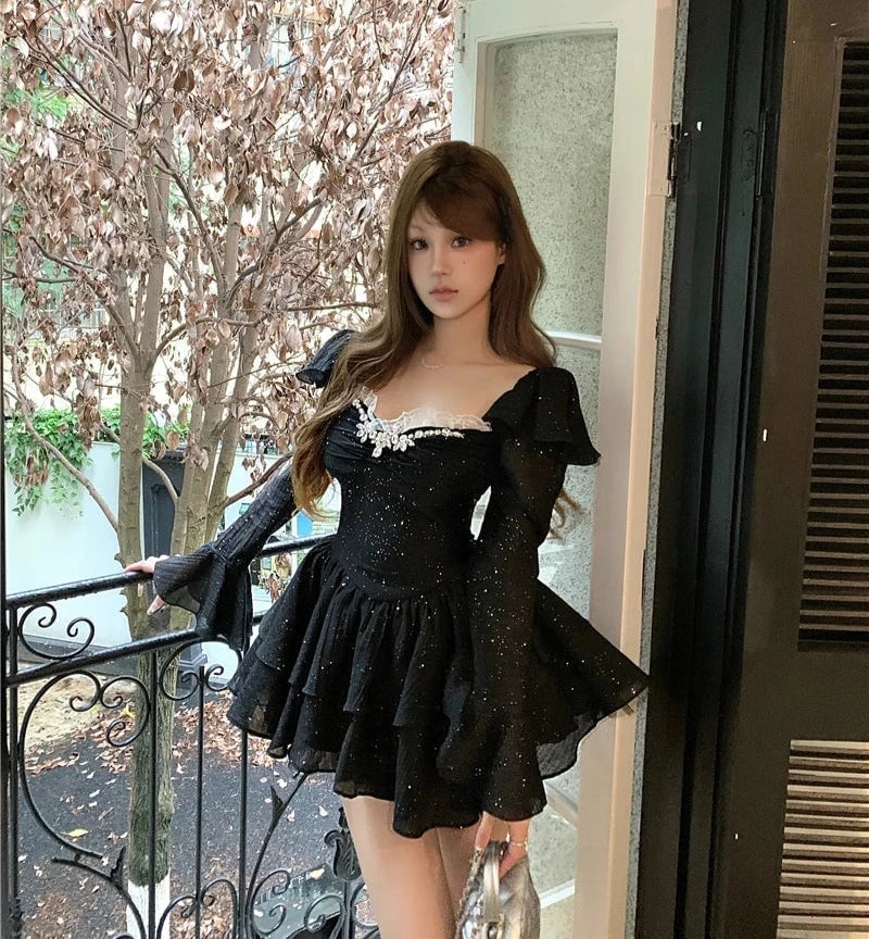 Sparkly black mini dress with ruffled tiers Sparkly black mini dress with ruffled tiers — Coquette Outfits