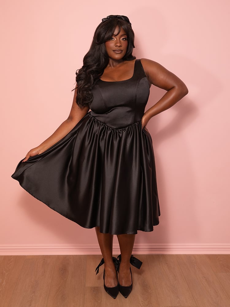 Black satin dress with full flared skirt Black satin dress with full flared skirt — Coquette Outfits