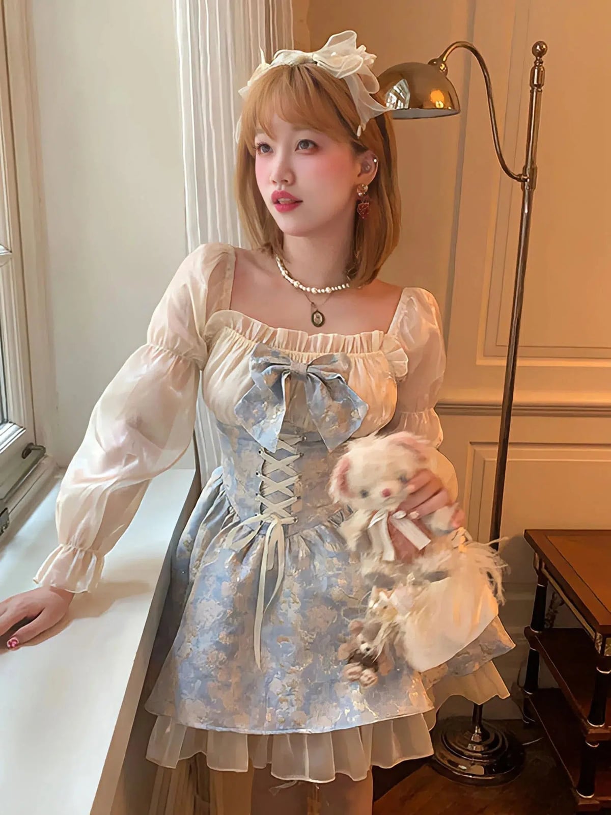 Blue brocade corset top over a sheer blouse Blue brocade corset top over a sheer blouse — Coquette Outfits