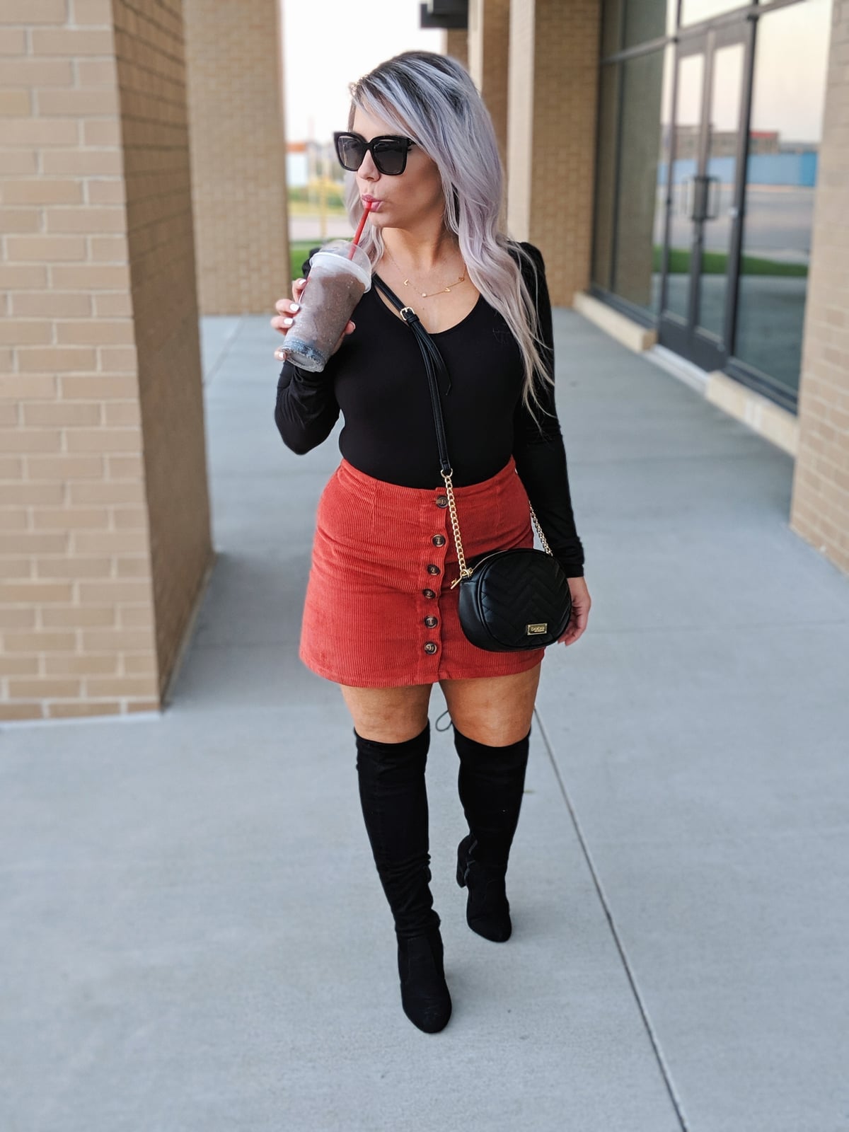 Red-Orange Corduroy Mini Skirt With Black Top and Tall, Close-Up Take Red-Orange Corduroy Mini Skirt With Black Top and Tall, Close-Up Take — Corduroy Skirt Outfit