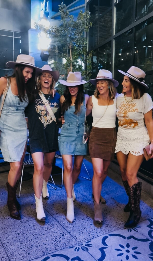 Denim dress and suede skirt with cowboy hats, Office-Safe Version Denim dress and suede skirt with cowboy hats, Office-Safe Version — Country Concert Outfits Ideas
