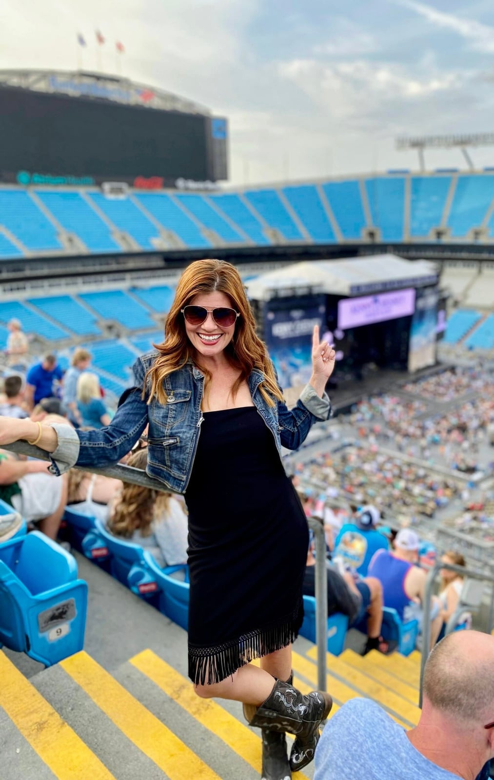 Black strapless dress with fringe and denim jacket, Close-Up Take Black strapless dress with fringe and denim jacket, Close-Up Take — Country Concert Outfits Ideas