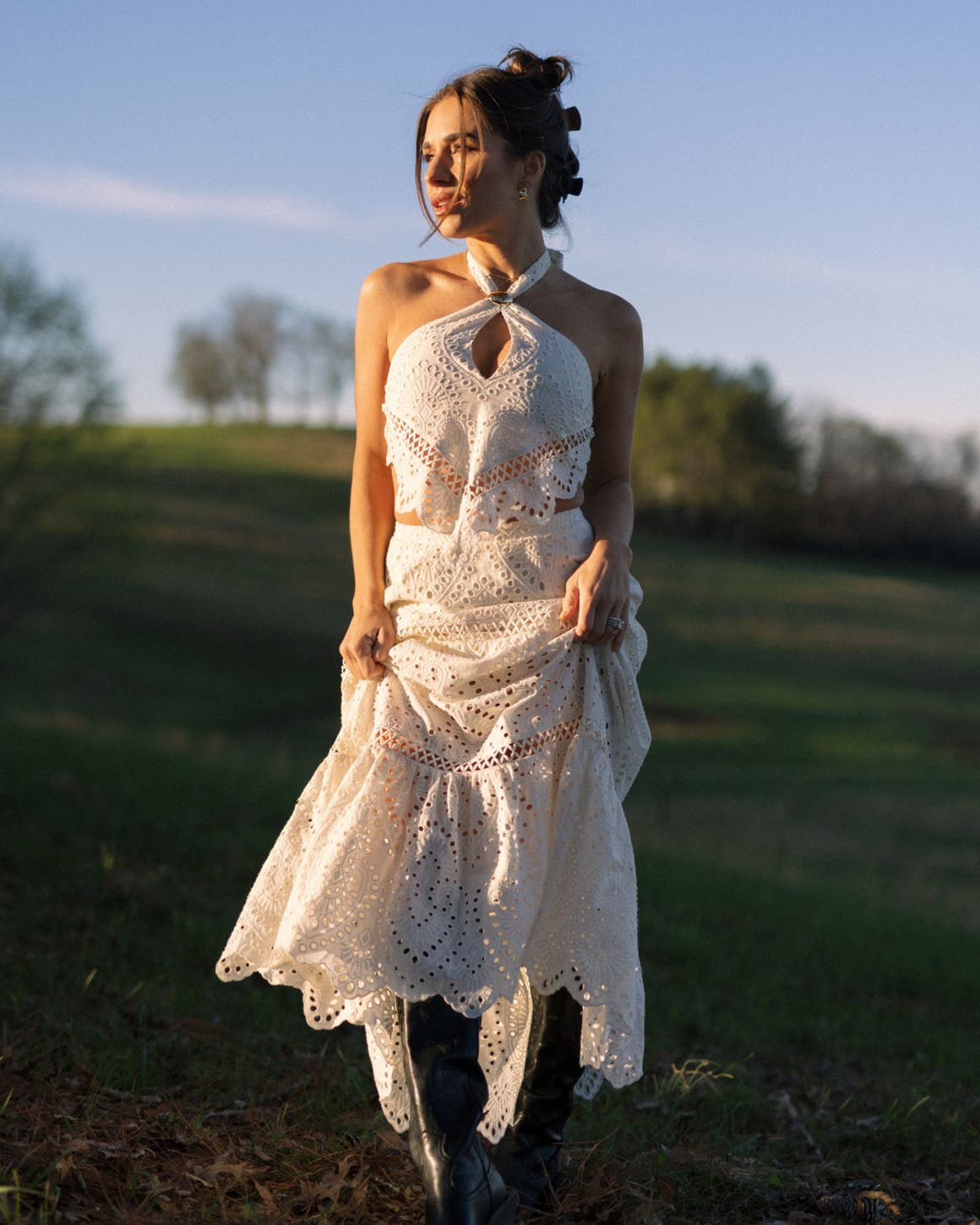 Eyelet lace crop top with flowing maxi skirt and knee-high boots Eyelet lace crop top with flowing maxi skirt and knee-high boots — Country Concert Outfits Ideas