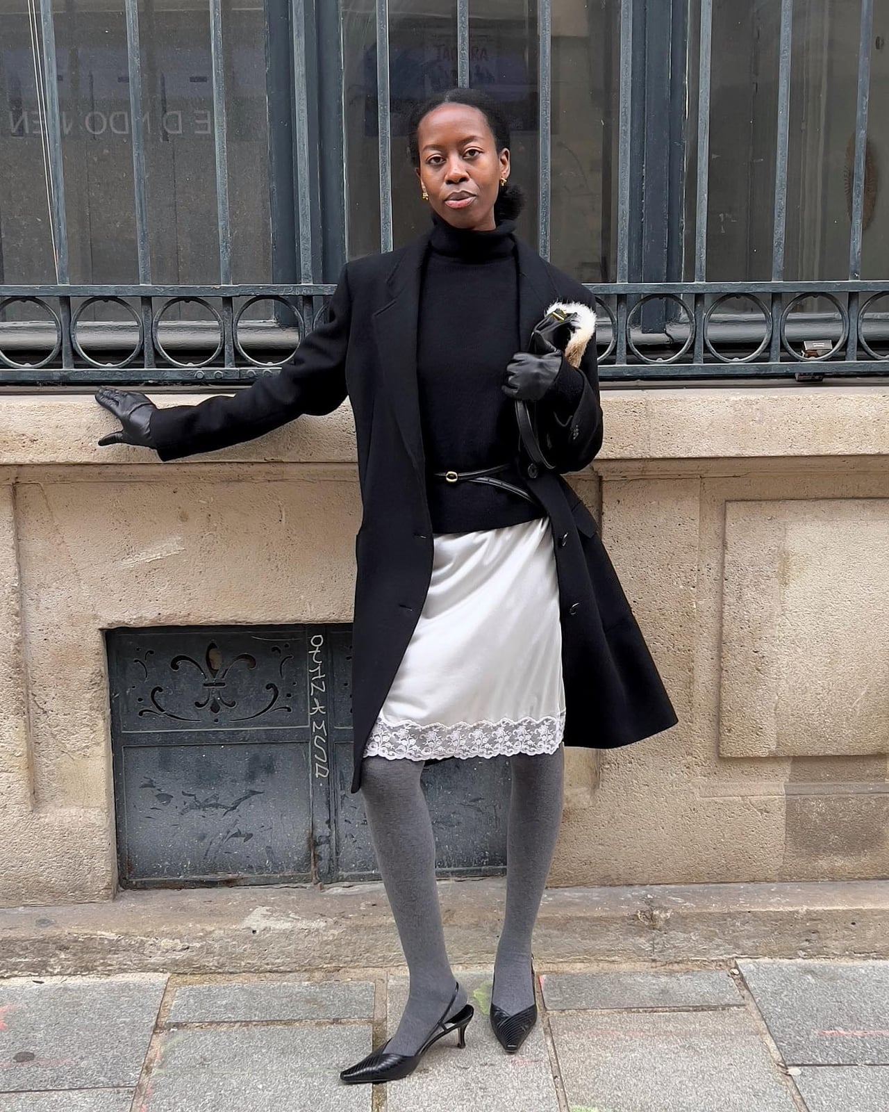 Black coat over lace-trimmed slip skirt Black coat over lace-trimmed slip skirt — Court Outfits
