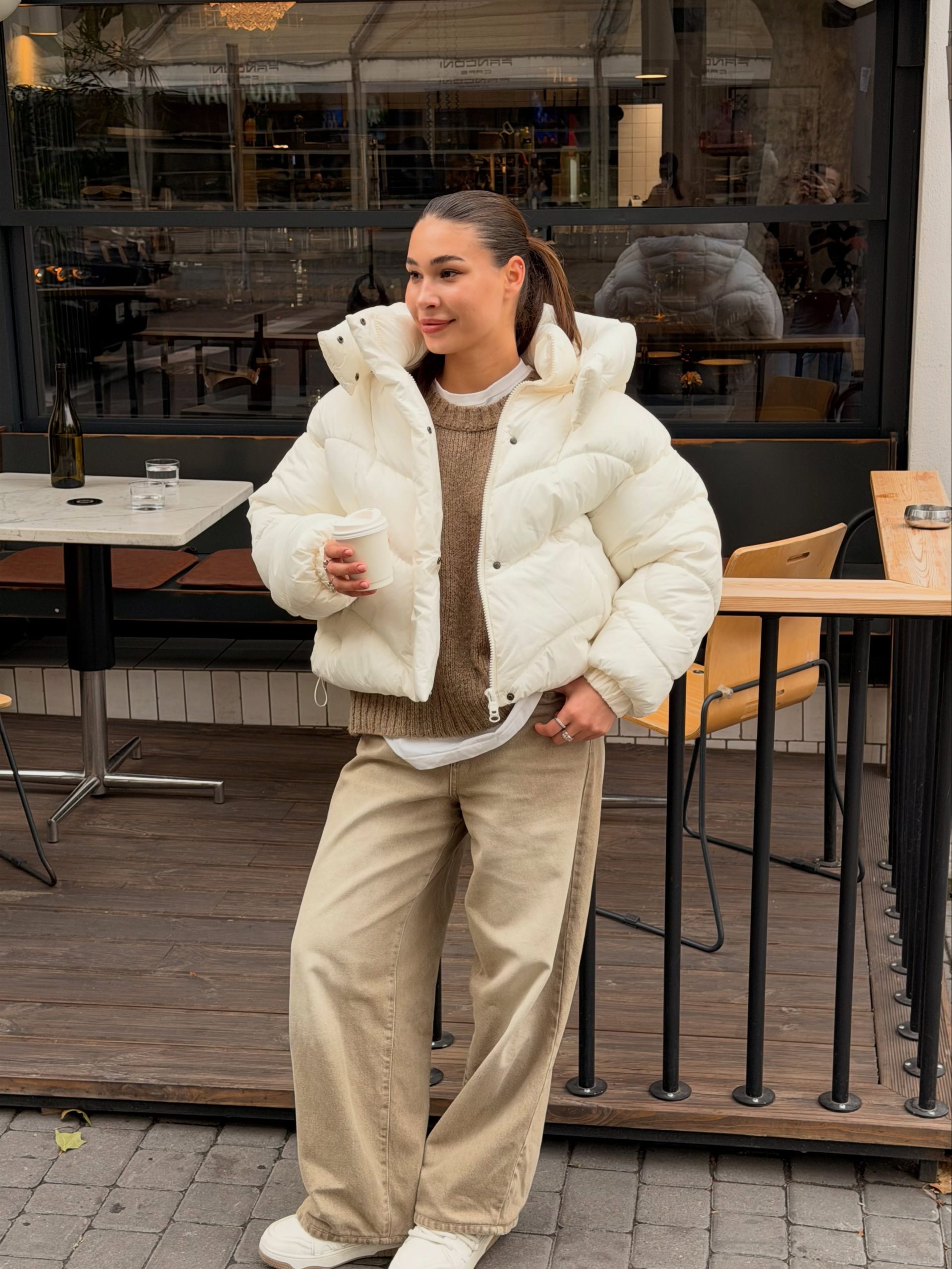 Cozy Cream Puffer With Brown Knit And Wide Leg Jeans