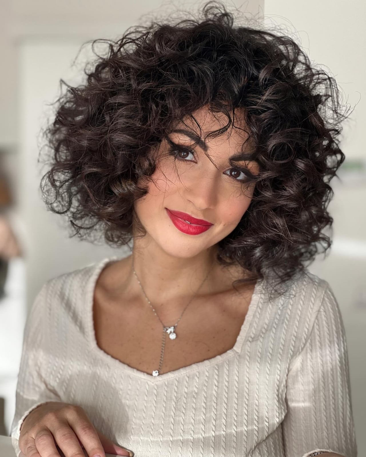 Mid-Back Curly Hair With Full Bangs Mid-Back Curly Hair With Full Bangs