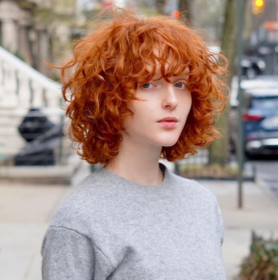 30 Cool Ways to Wear Trendy Curly Hair with Bangs in 2026 - Hair Adviser