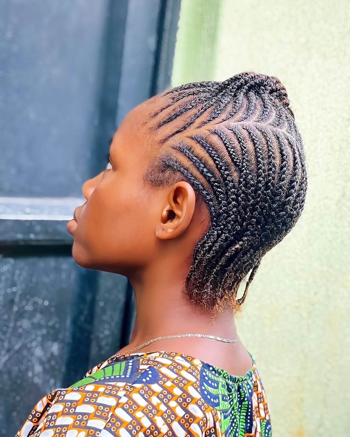 Curved Cornrows With Textured Coily Ends